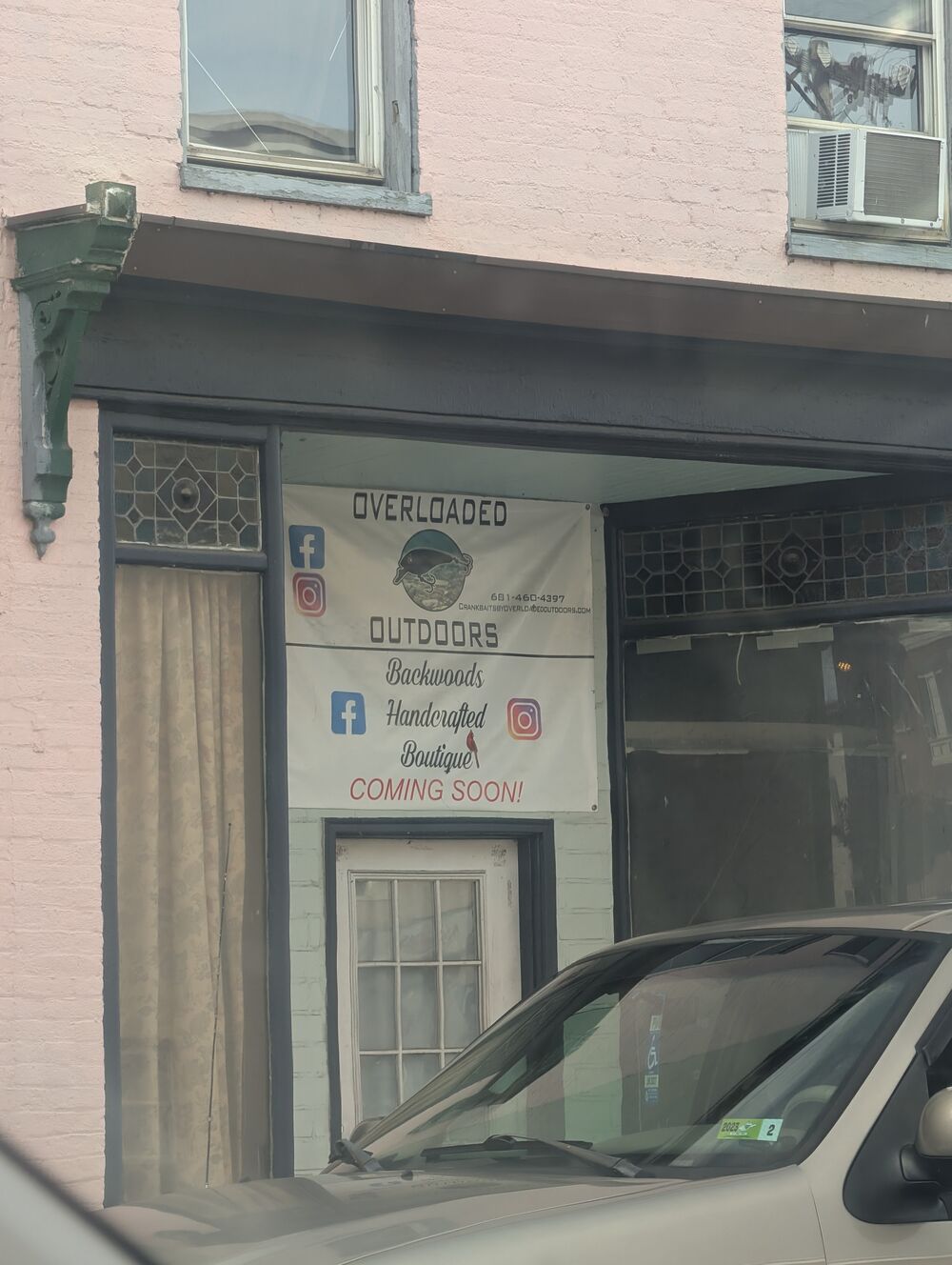 Peach-brick storefront with Coming Soon banner